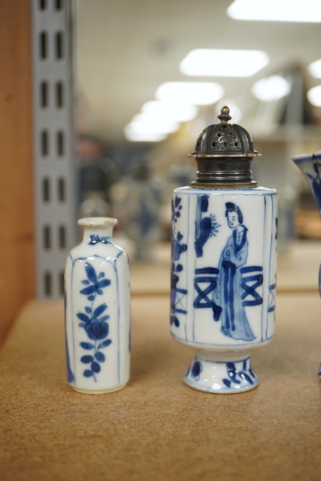 Five Chinese blue and white small vases, Kangxi period, one Dutch silver mounted as a sugar castor, tallest 11cm. Condition - varies